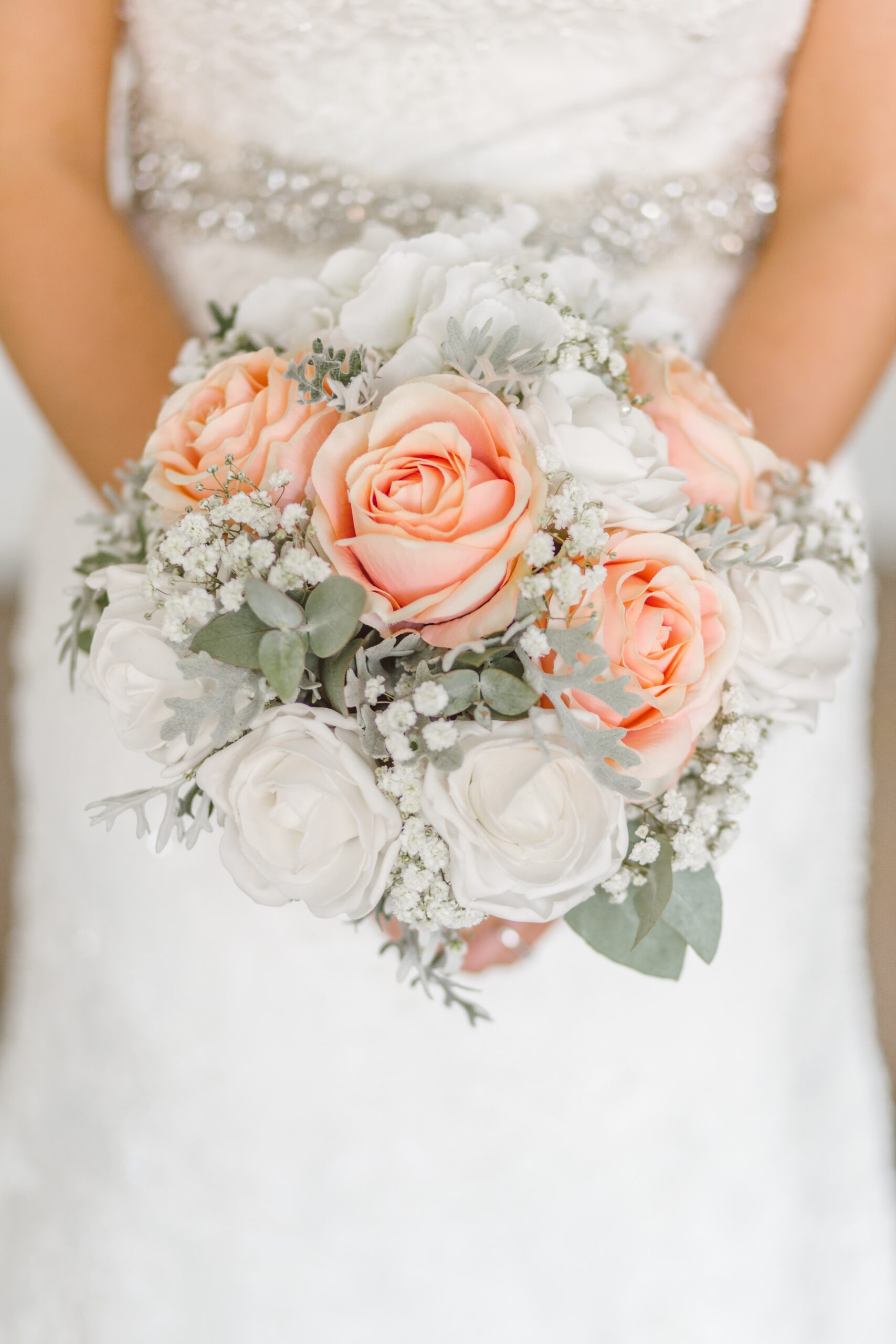 a bride holding flowers