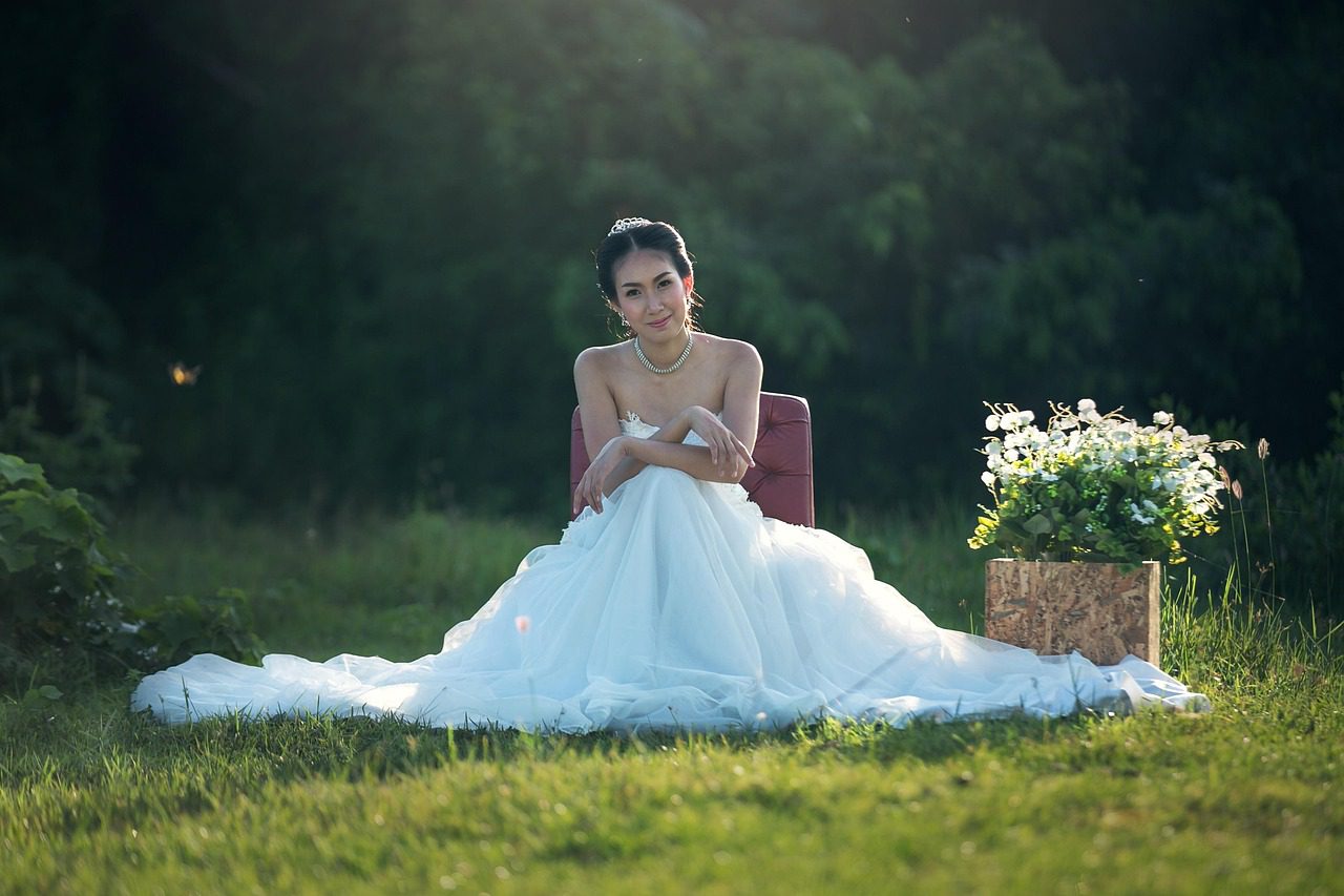 bride in a wedding dress sitting down