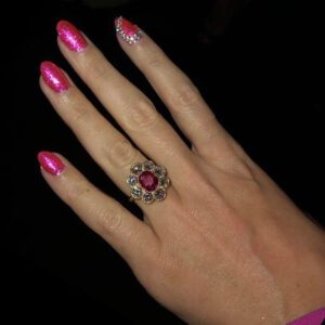 Katy Perry’s hand with her engagement ring on