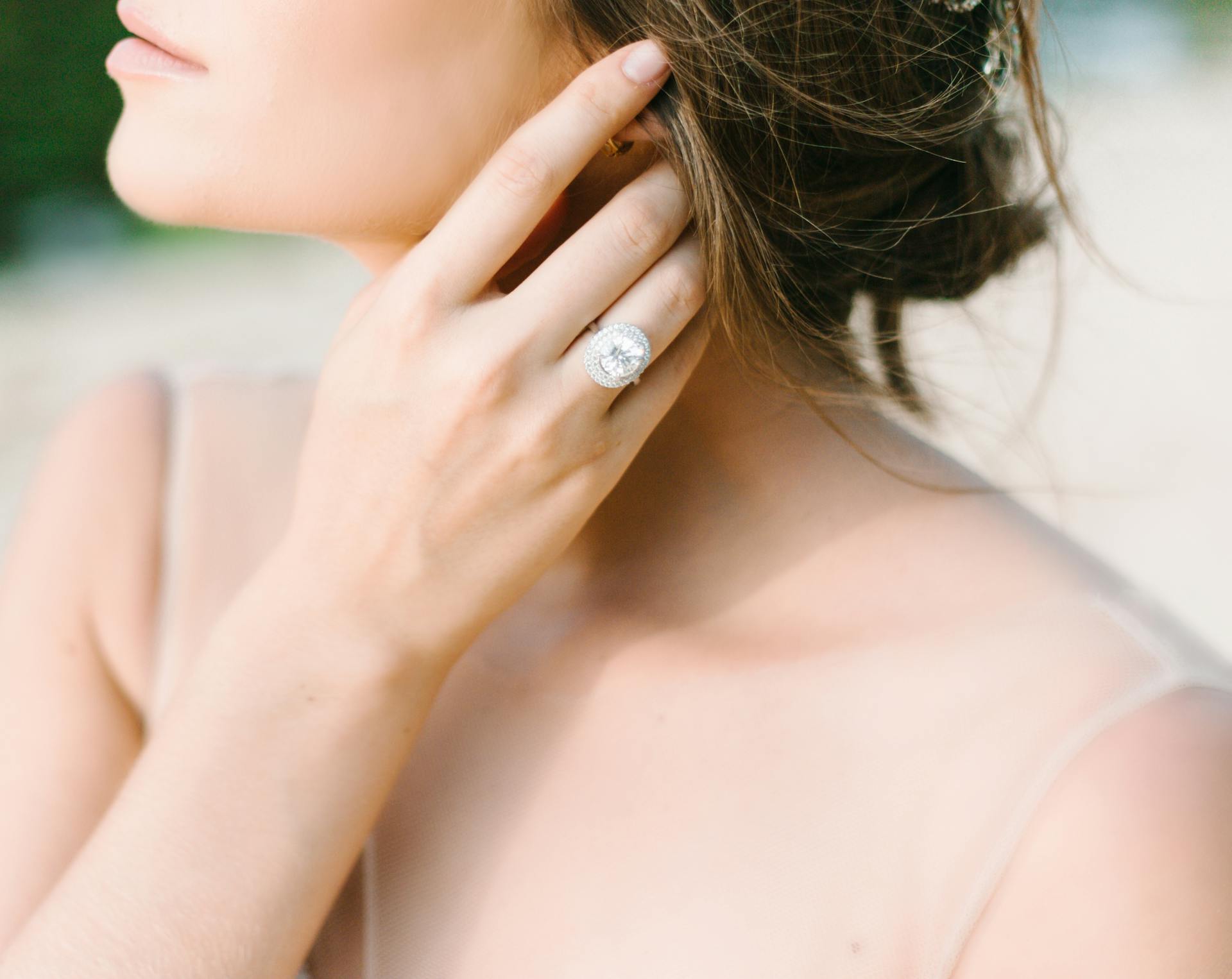 A woman wearing a diamond ring